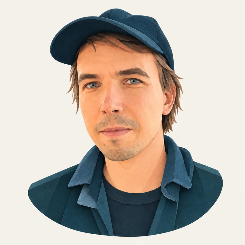 A paper sculpture portrait of Tõnis wearing a dark blue cap